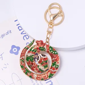 Exquisite Chinese style painted zodiac snake keychain detail with rhinestones and enamel.