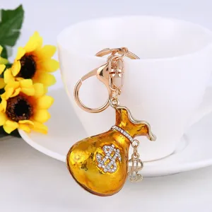 Porte-clés sac d'argent doré strass métal pendentif signe dollar accessoire pour sac