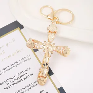 Portachiavi a croce in metallo dorato con strass e occhio di gatto, accessorio borsa.