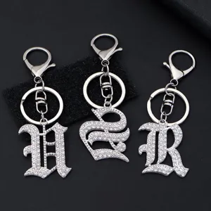 Silver rhinestone gothic letter keychains set, metal alphabet backpack charms and bag pendants.