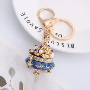 Chinese style treasure basin keychain with blue enamel, sparkling rhinestones and pearls for bag.