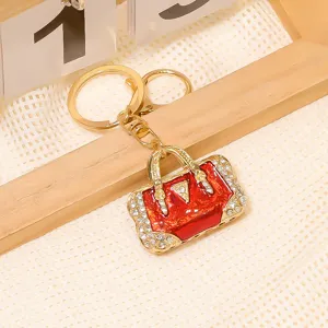 Exquisites Metall Strass Handtasche Schlüsselanhänger in Rot Emaille Design für Rucksack.