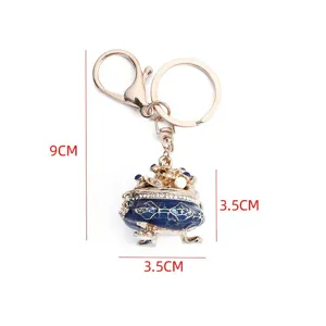 Chinese style cornucopia keychain detail, metal rhinestone lucky charm pendant accessory.
