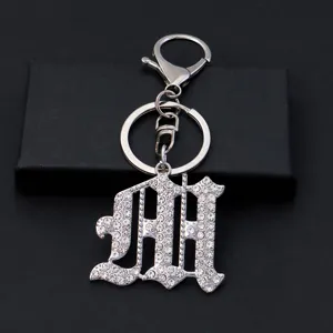 Silver rhinestone gothic letter keychain metal keyring bag pendant stylish birthday gift accessory.