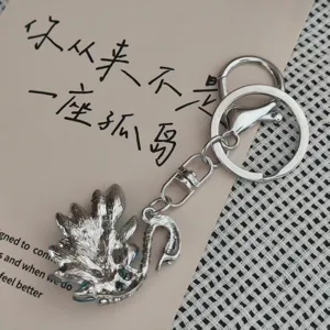 Fashion rhinestone swan keychain alloy bag pendant elegant crystal key ring for women.