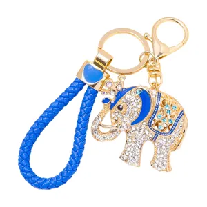 Porte-clés éléphant couronne en strass cristal de luxe avec sangle tressée bleue et or.