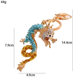 Chinese dragon keychain metal rhinestone pendant details view showing dimensions and weight for bags.