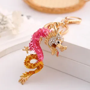 Rhinestone Chinese dragon keychain, sparkling crystal metal zodiac pendant for keys and bags.