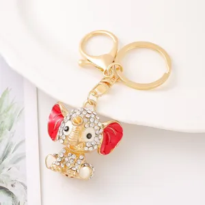 Portachiavi con elefante in strass carino, ciondolo in metallo dorato lucido per borsa e chiavi.