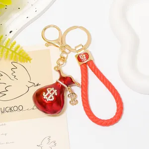 Alliage de Zinc Strass US Dollar Porte-clés Sac à Pièces Métal Clé Pendentif Chanceux Corde en Cuir Sac Porte-bonheur Charme