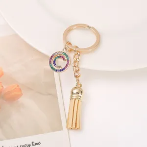 Korean style fashion keychain with crystal pendant and chic leather tassel accessory.