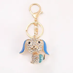Metal rhinestone long eared puppy dog keychain pendant jewelry accessory close up detail