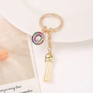Korean style rhinestone tassel keychain gold metal bag charm stylish accessory gift.