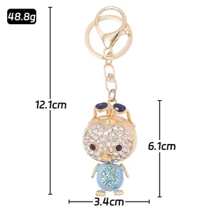 Llavero de cerdo con diamantes de imitación de lujo para mujer, colgante de bolso de metal.