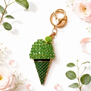 Rhinestone green ice cream cone keychain with metal keyring and floral charm pendant.