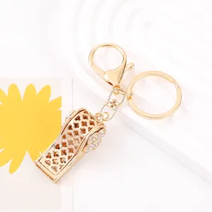Gold rhinestone clover whistle keychain cute metal car hanging pendant bag charm accessory