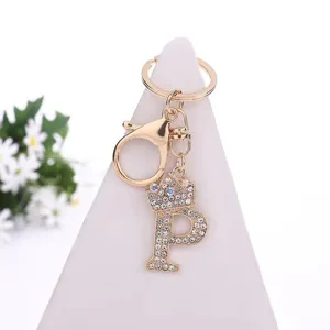 Rhinestone letter P keychain crown bag pendant gold tone metal accessories detail view
