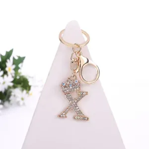 Rhinestone crown letter X keychain bag charm detailed view showing sparkling crystal details.