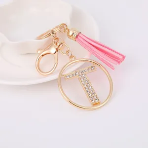Fashion metal rhinestone letter T pink tassel keychain bag pendant for women daily decoration.