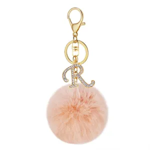 Faux rabbit fur pom pom keychain with rhinestone letter R pendant for bags and keys.