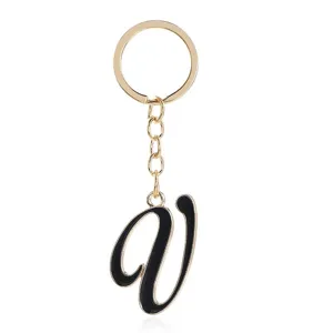 Fashion gold metal key chain with black enamel letter V pendant for women bags and keys.