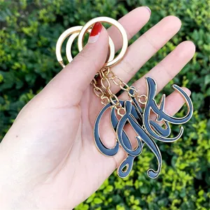 Fashion metal initial alphabet letter keychain pendant for women bags and keys stylish gift.