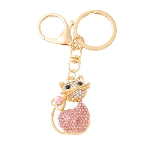 Metal rhinestone cat keychain pendant, cute pink crystal tail design for backpack keys decoration.