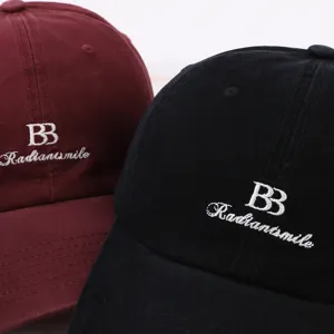 Casual cotton baseball cap with stylish embroidered letter design, versatile outdoor hat.