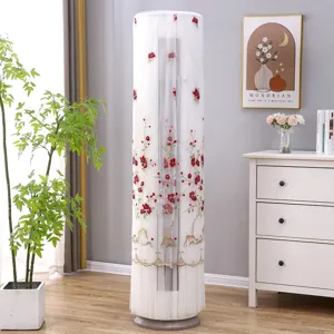 Detailed view of white vertical air conditioner dust cover with red floral embroidery mesh.