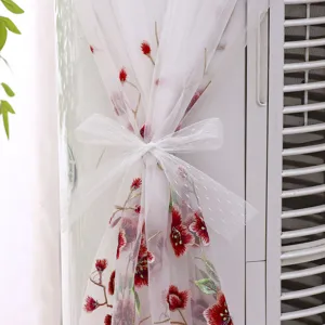 White sheer vertical air conditioner cover with red floral embroidery and bow knot detail.