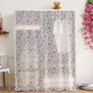 Detailed view of white lace cabinet curtain showing delicate floral patterns and dustproof design.