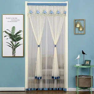 Details of the elegant lace anti-mosquito door curtain with blue floral embroidery mesh.
