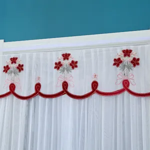 White sheer short door curtain with red floral embroidery, delicate lace and scalloped trim.