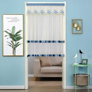 Lace anti-mosquito door curtain with blue floral embroidery and double-layer gauze design.