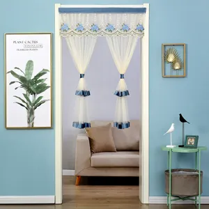 Double layer lace door curtain with blue floral embroidery and tie backs for home decor detail.