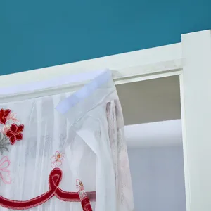 Punch-free mesh door curtain with elegant red floral embroidery and convenient Velcro top design.