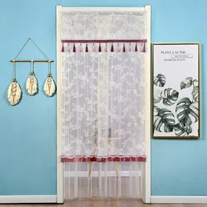 Detailed view of the double-layer lace door curtain with decorative tassels and fringe.