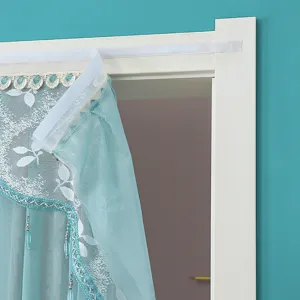 Blue lace mesh door curtain detail view, punch-free hook and loop fastening, home decor.