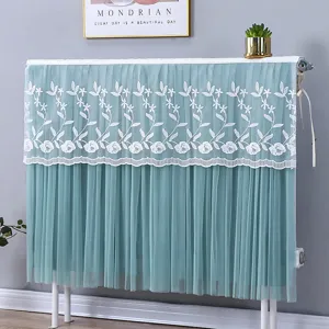 Blaugrüne Tüll-Spitzen-Heizkörper-Staubabdeckung mit eleganter weißer Blumenstickerei.