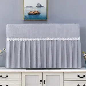 Grey furry TV dust cover detail with elegant white lace trim for home decor scene view.