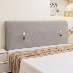 Grijs gebreide hoofdbordhoes elastische stofdichte beschermer voor slaapkamerbed.