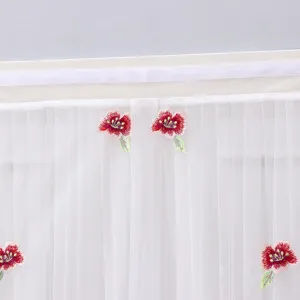 White sheer door curtain with delicate red floral embroidery for bedroom and home decor.