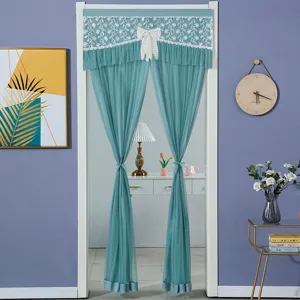 Green lace door curtain with white floral embroidery and bow for room partition and home decor.