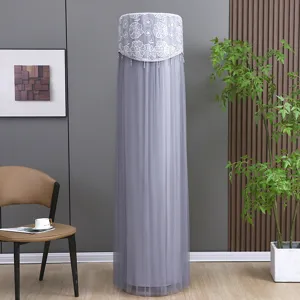 Detailed view of a modern grey cylindrical air conditioner dust cover with elegant lace embroidery.