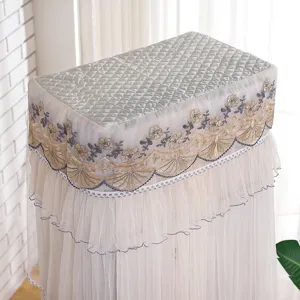 Detailed view of upright vertical air conditioner dust cover featuring quilted top and lace embroidery.