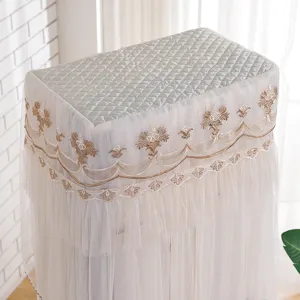 Vertical air conditioner dust cover with quilted top and elegant lace tulle fringe.
