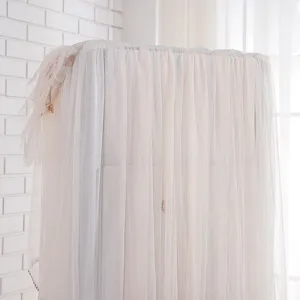 Elegant vertical air conditioner dust cover with delicate lace fabric for home decor.