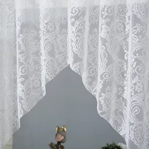 Close-up shot showing exquisite white lace floral pattern and elegant drape of half curtain.