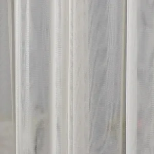 Close-up detail of white lace mesh fabric curtain texture, lightweight and breathable material.