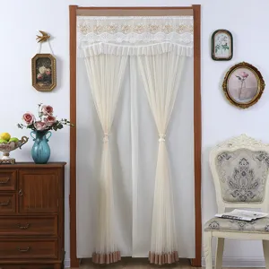 Detailed view of the elegant lace short curtain with exquisite embroidery and sheer mesh fabric.